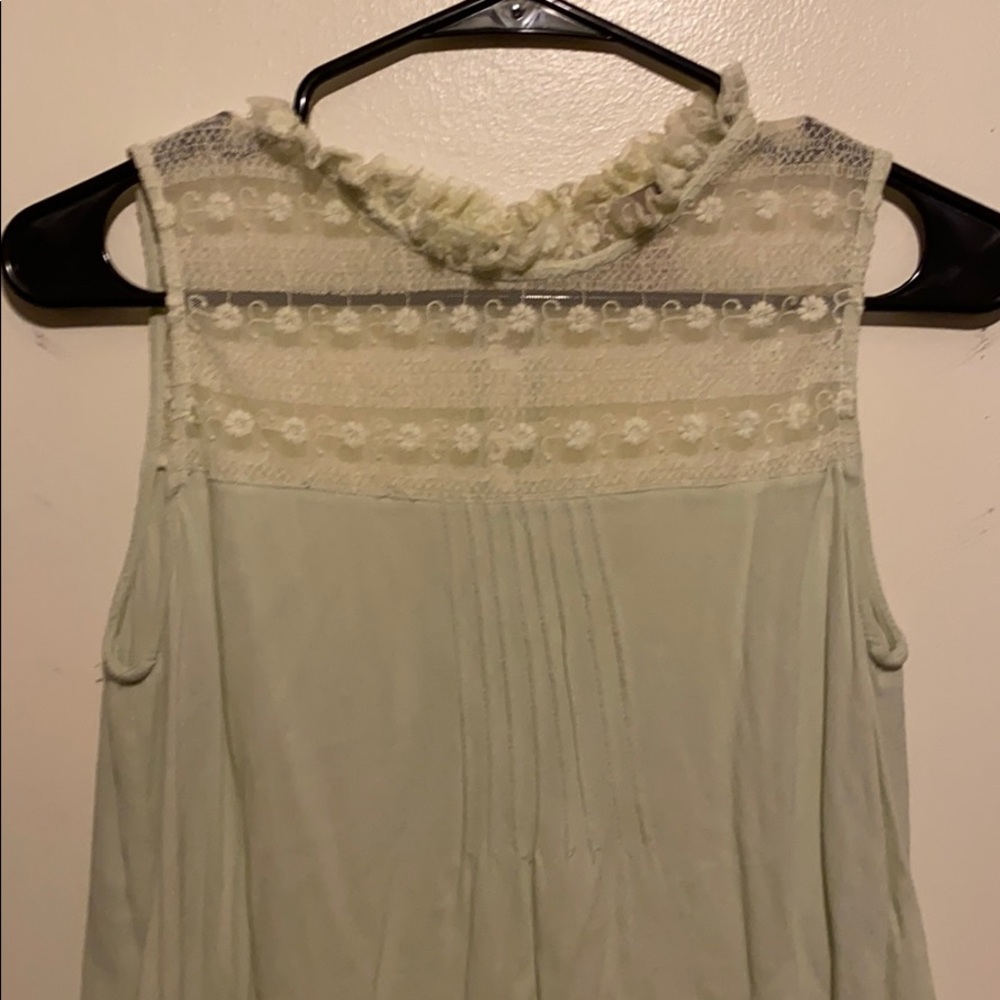 Pistachio sleeveless top with lace detailing
